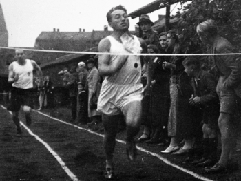 Adi was a keen athlete, seen here reaching the finish line in 1935